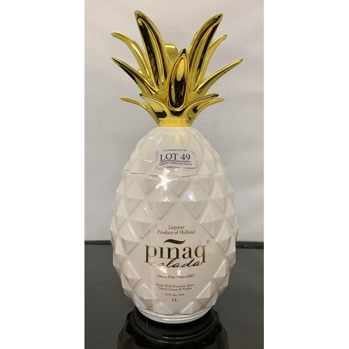 49 - PINAQ LIQUEUR - PINA COLADA IN DECORATIVE CERAMIC PINEAPPLE JAR - 1L 17%