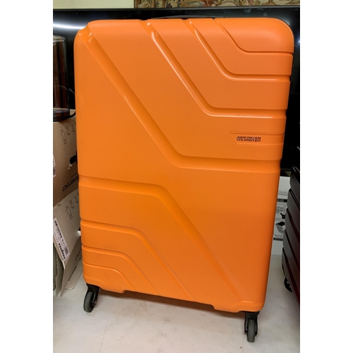 192 - LARGE AMERICAN TOURISTER JETDRIVER HARDSIDE SUITCASE - NEON ORANGE