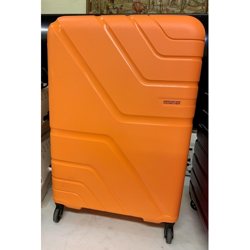 193 - LARGE AMERICAN TOURISTER JETDRIVER HARDSIDE SUITCASE - NEON ORANGE