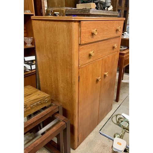 267 - A HEALS STYLE LIGHT OAK 1960'S TALL BOY OF 2 DRAWERS ABOVE DOUBLE DOOR CABINET BASE