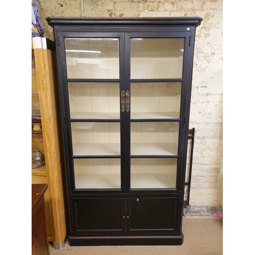 257 - EBONISED BOOKCASE WITH WHITE INTERIOR, 2 GLASS DOORS & 2 DOOR CUPBOARD BASE - FOUR SHELVES MAGNETIC ... 