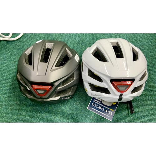 135 - LUMIERE BICYCLE HELMET WITH BUILT IN LED LIGHTS - AGE 14 PLUS AND ONE OTHER