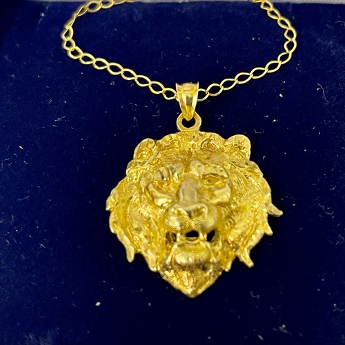 329 - 9CT GOLD LIONS HEAD PENDANT ON 20