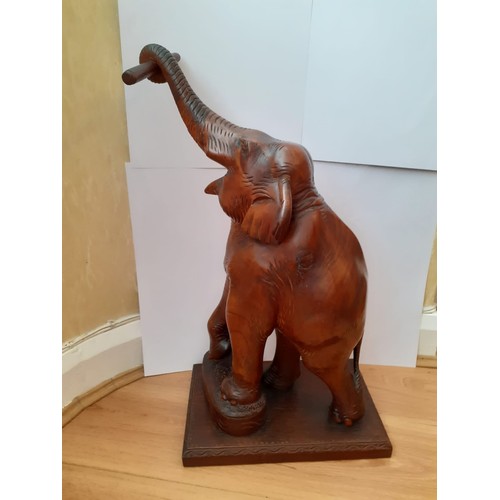 213 - Large well carved early 20c hardwood elephant, 59cm (height) – 33cm (width) at the base.