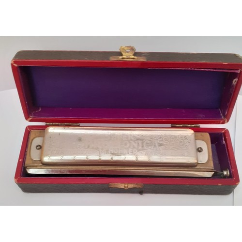 226 - A vintage boxed super Chromonica made by M.Hohner, 15cm in length No 260 ½