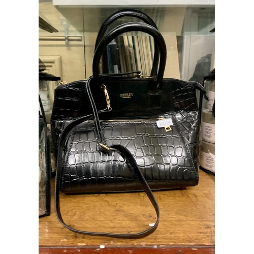 200 - OSPREY LONDON LADIES HANDBAG IN BLACK WITH DUST COVER (VERY SLIGHT SCUFF TO CORNER)