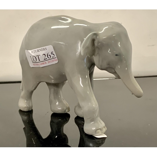 265 - ROYAL COPENHAGEN 599 - WALKING ELEPHANT CALF - THOMAS MADSEN - 13.5L X 9H CMS.