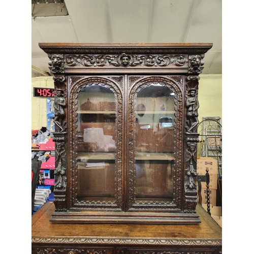 317 - A HEAVILY CARVED CONTINENTAL (POSS. FRENCH) OAK BUFFET SIDEBOARD BASE OF 2 DRAWERS & 2 DOOR CUPBOARD... 