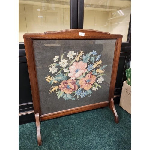 322 - OAK FRAMED  & GLAZED WOOL TAPESTRY FIRE SCREEN ON RAISED LEGS