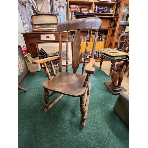 329 - ANTIQUE OAK ROCKING CHAIR