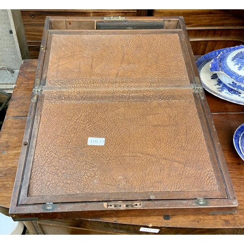 378 - A BRASS BOUND MAHOGANY WRITING SLOPE WITH HIDDEN DRAWER