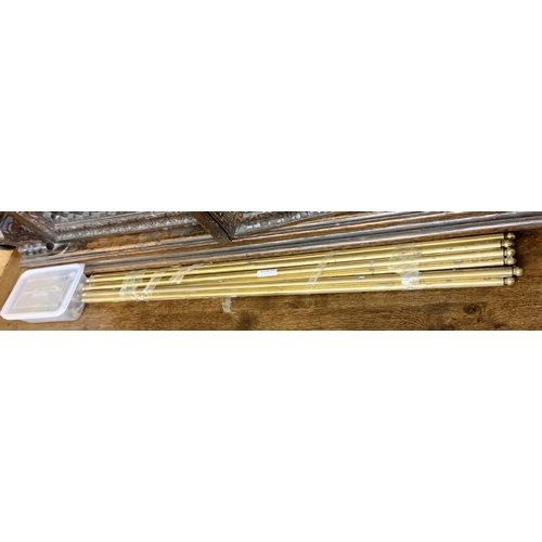 391 - A SET OF 12 BRASS STAIR RODS WITH END FITTINGS