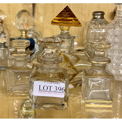 396 - 3 X VINTAGE GILDED SCENT BOTTLES WITH LIDS