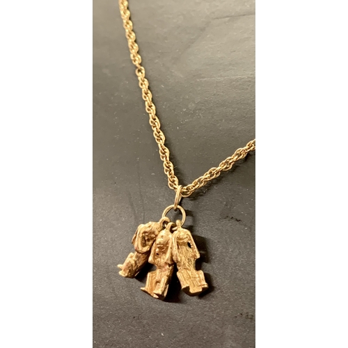 480 - 9CT GOLD THREE WISE MONKEY PENDANT ON 24