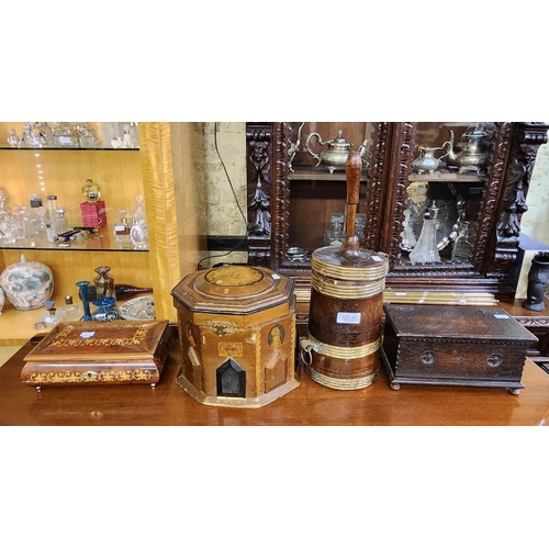 427 - A VINTAGE OCTAGONAL SEWING BOX, A SMALL DARK OAK MUSIC BOX, A MODERN MUSIC BOX AND A BRASS BOUND OAK... 