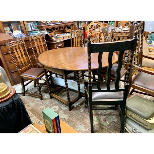 328 - A JACOBEAN OAK STYLE OVAL DROPLEAF GATELEG TABLE -TWIST LEGS AND TURNED FEET (OPEN 112WX150LX75H CMS... 