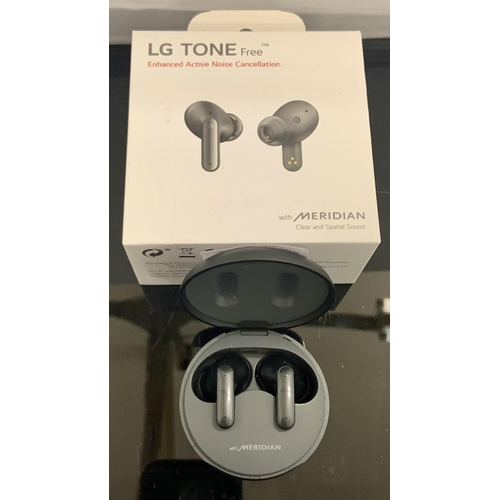 16 - BOXED PAIR OF LG TONE FREE ENHANCED ACTIVE NOISE CANCELLATION EAR BUDS IN CHARGING CASE