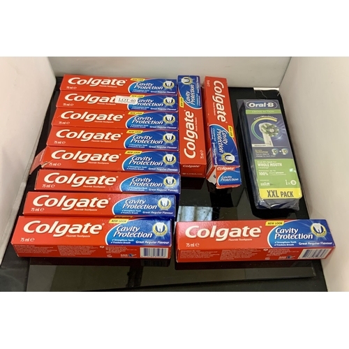 40 - 11 X PACKS OF COLGATE 75ML CAVITY PROTECTION TOOTHPASTE TOGETHER WITH A QTY OF ORAL B REPLACEMENT TO... 