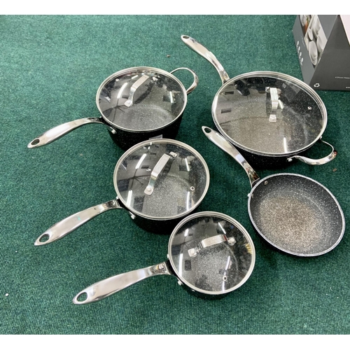 107 - A STARFRIT THE ROCK 9 PIECE PAN SET - 5 PANS/4 LIDS - PREVIOUS USEAGE