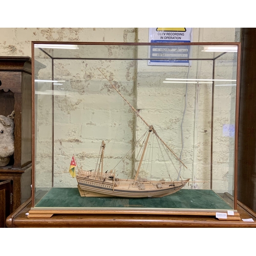 239 - LARGE GLASS DISPLAY CASE WITH A MODEL OF AN ARABIAN DHOW, THE AL BAHRAN - 70 X 57 X 24CM