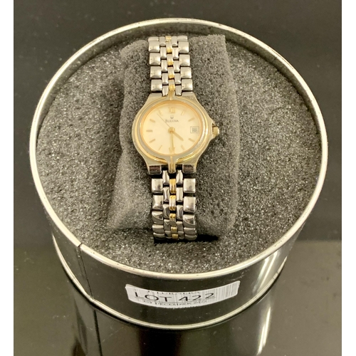 422 - TWO TONE BULOVA WRISTWATCH (MARKS TO FACE COMMENSURATE WITH USAGE)