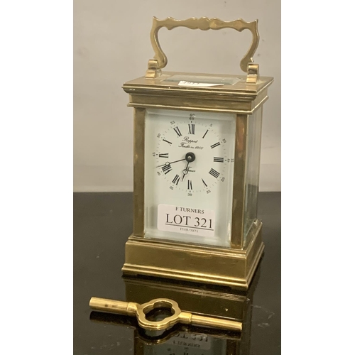 321 - A BRASS CARRIAGE CLOCK MARKED RAPPORT FONDEE 1900 FRANCE WHITE DIAL WITH ARABIC & ROMAN NUMERALS