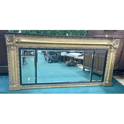 348 - A REGENCY GILDED OVERMANTEL OF 3 MIRRORED DIVISIONS WITH EBONISED FILLETS C.1810
148cm wide by 70cm ... 