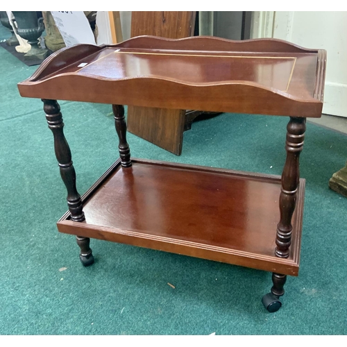 370 - MODERN ROSEWOOD VENEER WITH BRASS INLAY TWO TIER TEA TROLLEY ON CASTORS