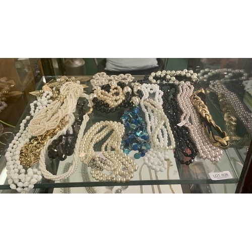 408 - A QTY OF COSTUME JEWELLERY NECKLACES