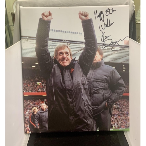 423 - LIVERPOOL FOOTBALL CLUB MEMORABILIA - A SIGNED BOX PRINT OF KENNY DALGLISH -SIGNED BY MR DALGLISH