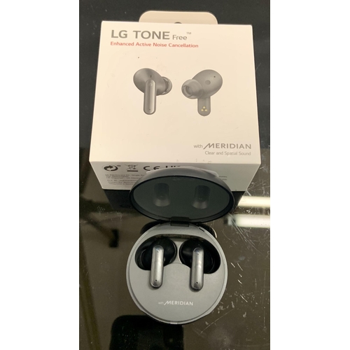 21 - BOXED PAIR OF LG TONE FREE ENHANCED ACTIVE NOISE CANCELLATION EAR BUDS WITH CHARGING WIRE