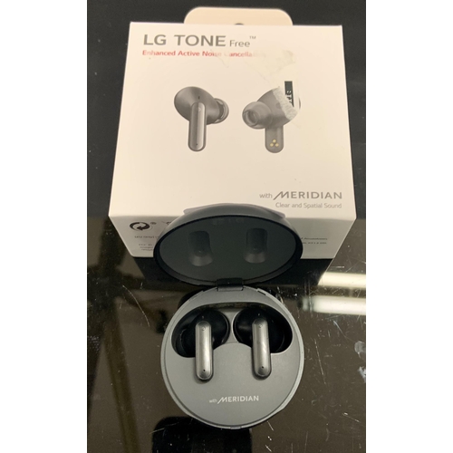 22 - BOXED PAIR OF LG TONE FREE ENHANCED ACTIVE NOISE CANCELLATION EAR BUDS WITH CHARGING WIRE