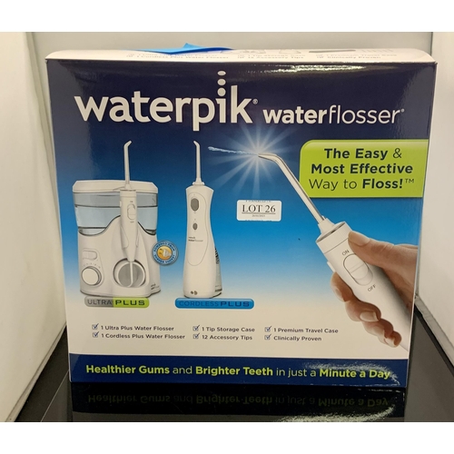 26 - BOXED WATERPIK WATER FLOSSER ULTRA PLUS/CORDLESS PLUS