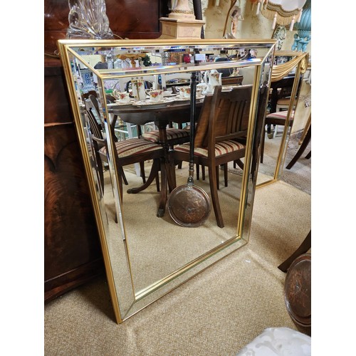 270 - A GILDED RECTANGULAR CUSHION GLASS ON GLASS MIRRORED LOOKING GLASS - H:100 X W:80CMS