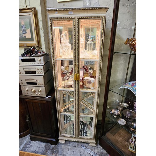 292 - AN UNUSUAL GLAZED AND MIRRORED TRIANGULAR DISPLAY CABINET - WITH MAGNETIC CLOSING DOORS - 3 FITTED F... 