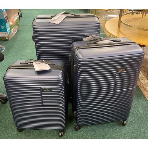 245 - ROCK PACIFIC 3 PIECE HARDSIDE SUITCASE SET LARGE,MEDIUM AND CABIN (NOTE LARGE CASE HAS VERY SMALL DE... 