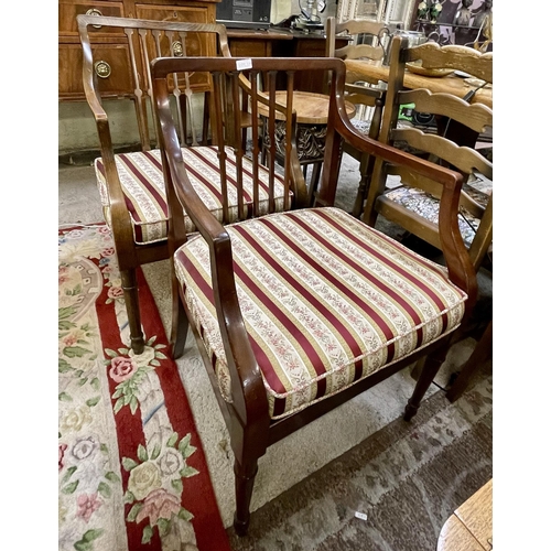 339 - A PAIR OF REPRODUCTION MAHOGANY HALL CHAIRS WITH THICK REGENCY STRIPE FITTED CUSHIONS