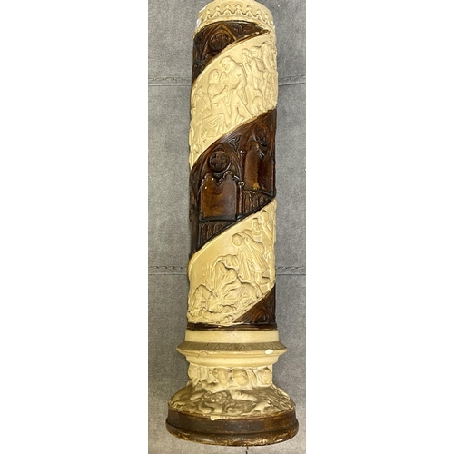 349 - A PLASTER CYLINDER VASE WITH MEDIEVAL STYLE FIGURES IN A SPIRAL PATTERN