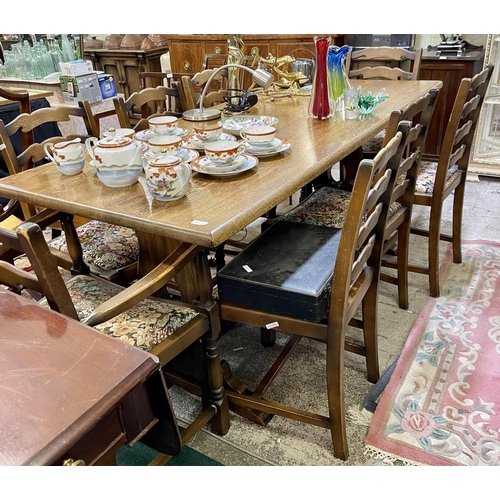 350 - AN ERCOL YEW REFECTORY DINING TABLE WITH 8 MATCHING LADDER DINING CHAIRS (6+2 CARVER ARM CHAIRS)