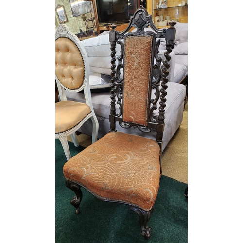 341A - HEAVILY CARVED OAK VICTORIAN HALL CHAIR ON CASTORS