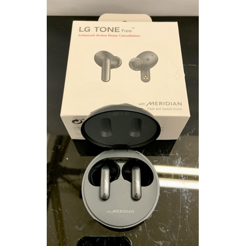 12 - BOXED PAIR OF LG TONE FREE ENHANCED ACTIVE NOISE CANCELLING EAR BUDS