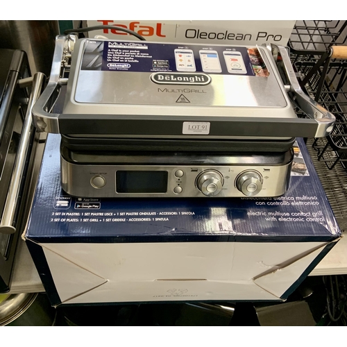 91 - BOXED DELONGHI MULTI GRILL - ELECTRIC MULTI USE CONTACT GRILL WITH ELECTRONIC CONTROL - 2 GRILL PANS... 