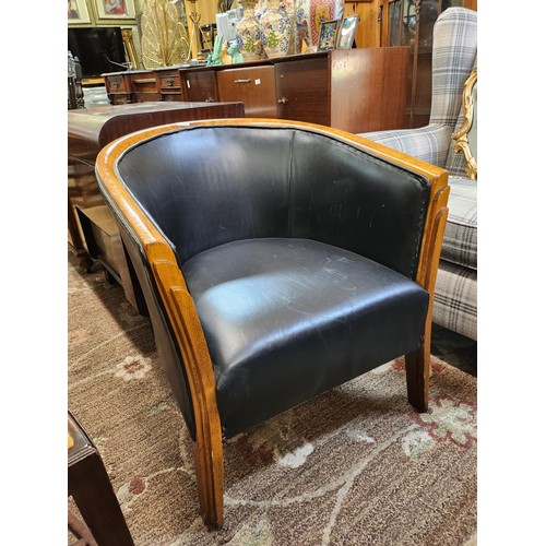 310 - DANISH STYLE MID CENTURY BLACK LEATHER AND VARNISHED OAK TUB CHAIR