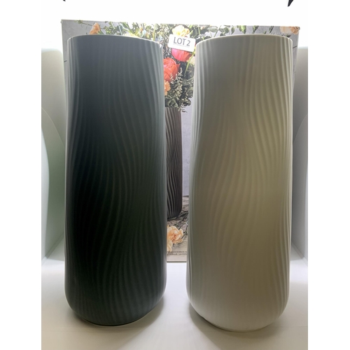 2 - BOXED SET OF 2 OVER AND BACK PORCELAIN VASES - GREEN/WHITE (SMALL CHIP TO RIM OF GREEN)