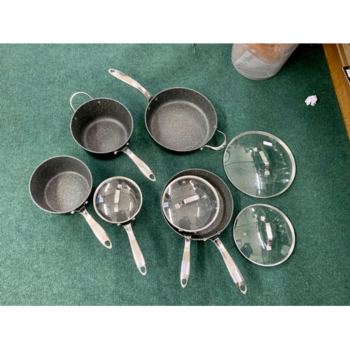 123 - 10 PIECE STARFRIT THE ROCK COOKWARE SET - 6 PANS/4 LIDS - VERY SLIGHT PREVIOUS USEAGE