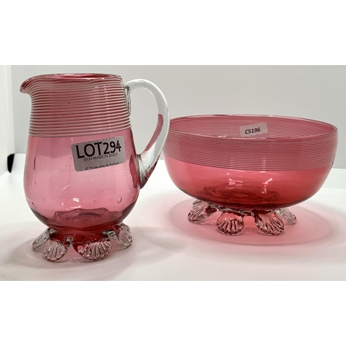 294 - EARLY VICTORIAN CRANBERRY GLASS JUG AND BOWL C. 1840 WITH LACITTINO TRIM, STRIPE DETAIL