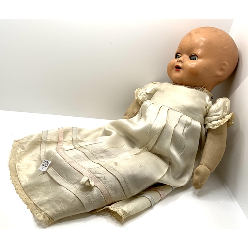 299 - A VINTAGE DOLL - WITH SOFT BODY, BISQUE HEAD, AND ORIGINAL TAFFETTA DRESS