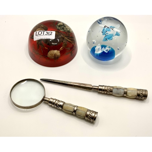 312 - PLATED MOTHER OF PEARL HANDLED LETTER AND MAGNIFYING GLASS, GLASS PAPER WEIGHT AND A WELSH SHELL ART... 