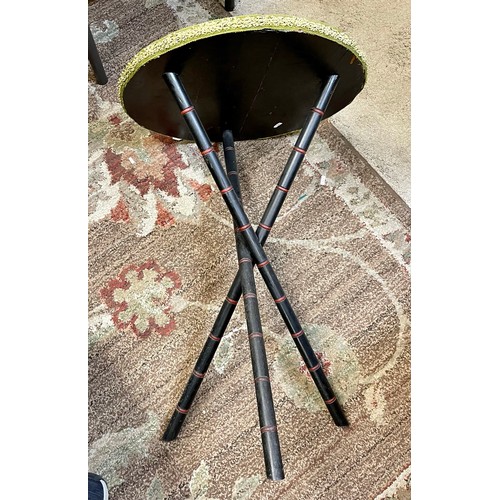 229 - AN EBONISED VICTORIAN TRIPOD CIRCULAR SIDE TABLE WITH FAUX BAMBOO CROSSED LEGS AND BROCADE DECORATIV... 