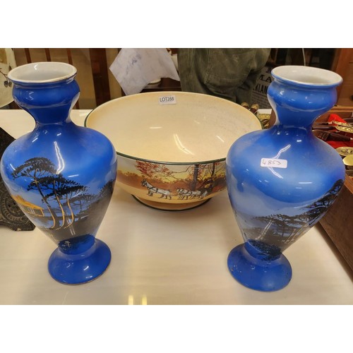 288 - A PAIR OF HAND PAINTED BOW BLUE ORIENTAL STYLE VASES AND A ROYAL DOULTON HUNTING SCENE BOWL